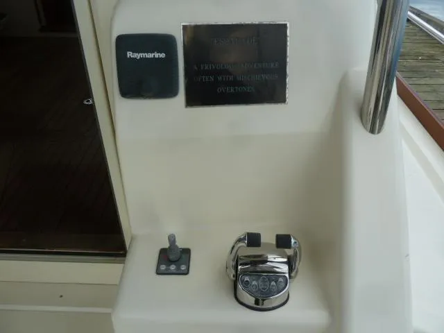 Slide: The Image of Control panel of a 2006 Sabre 38 Express boat with Raymarine equipment. - 7