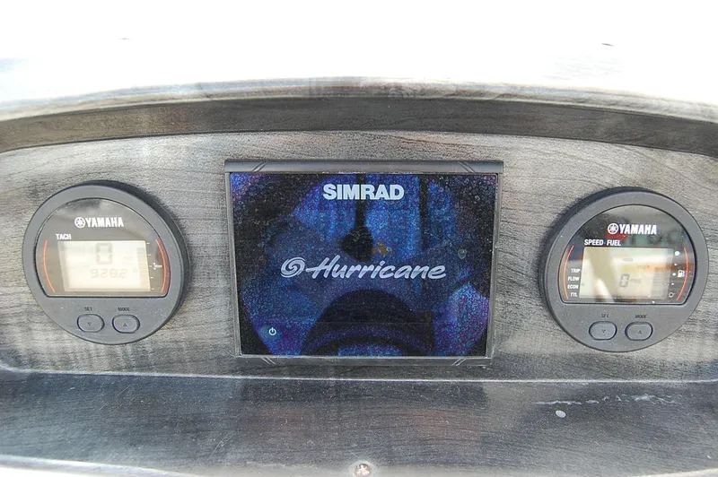 Slide: The Image of Dashboard of 2019 Hurricane SunDeck Sport 188 OB with Simrad and Yamaha displays. - 14