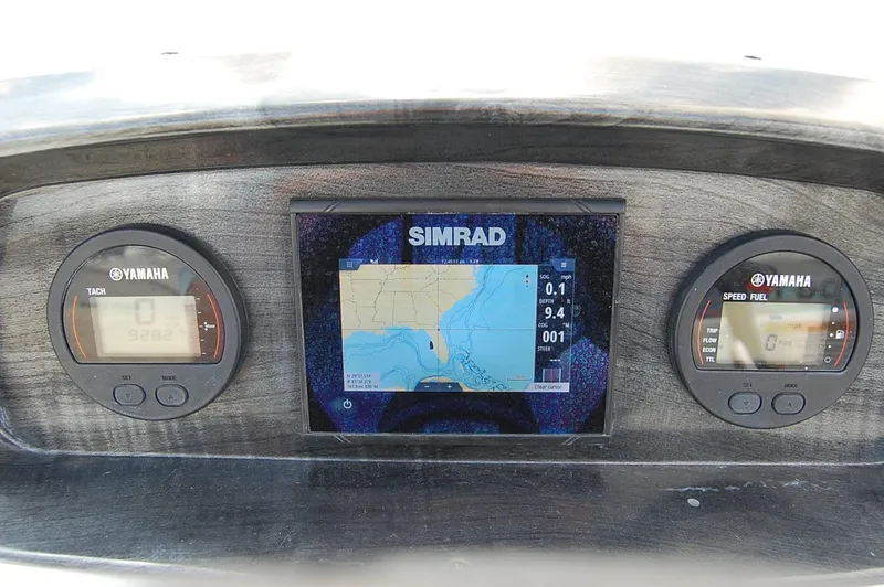Slide: The Image of Dashboard of 2019 Hurricane SunDeck Sport 188 OB with Simrad navigation display. - 15