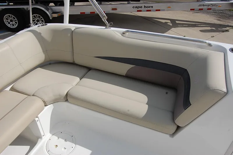 Slide: The Image of 2019 Hurricane SunDeck Sport 188 OB boat interior seating, beige upholstery, and sleek design. - 17