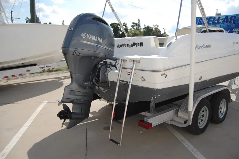 Slide: The Image of 2019 Hurricane SunDeck Sport 188 OB boat on trailer with Yamaha outboard motor. - 3