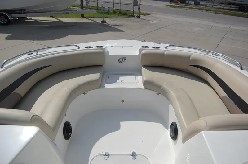 Slide: The Image of 2019 Hurricane SunDeck Sport 188 OB boat interior with beige seating. - 4