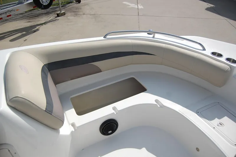 Slide: The Image of 2019 Hurricane SunDeck Sport 188 OB boat interior with cushioned seating and storage. - 9