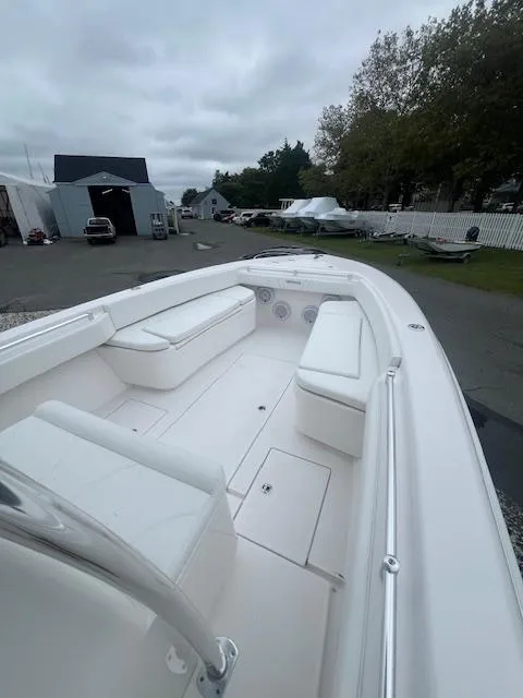 Slide: The Image of 2024 Contender 28 Tournament boat with spacious seating and sleek design. - 4