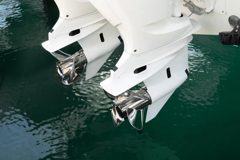 Slide: The Image of 2024 Jeanneau Leader 9.0WA S2 boat propellers in water. - 24