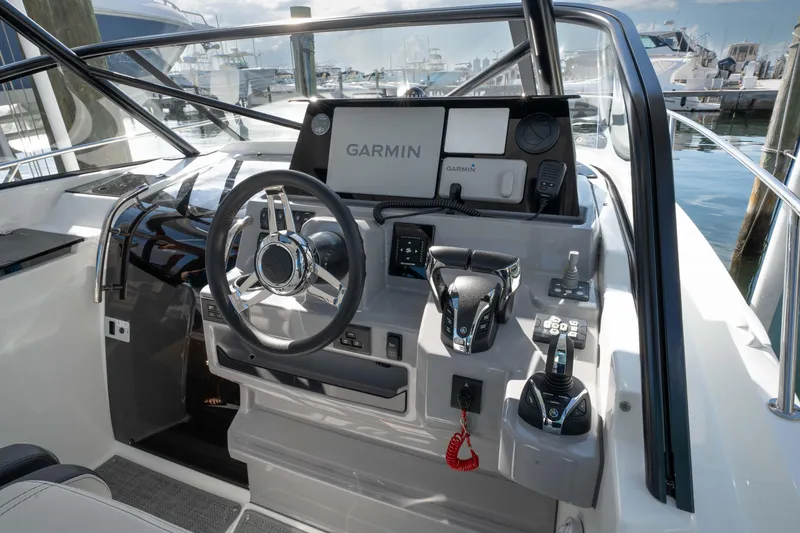Slide: The Image of 2024 Jeanneau Leader 9.0WA S2 helm with Garmin navigation system. - 27