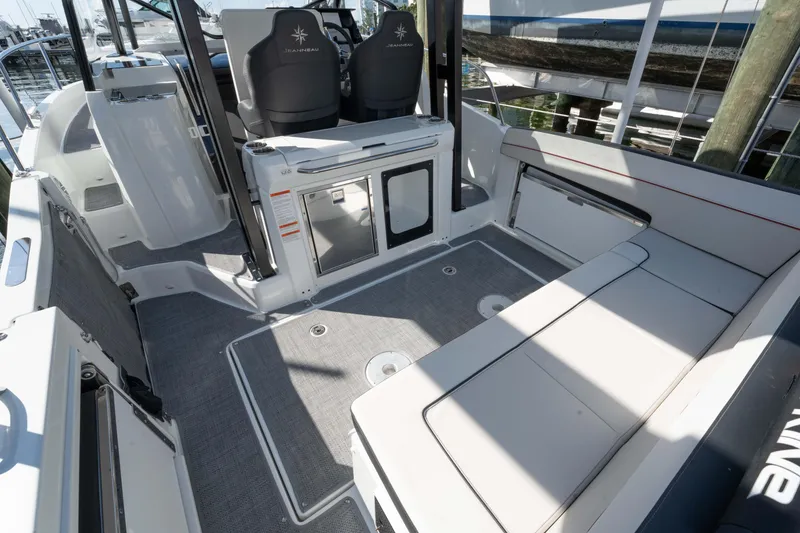 Slide: The Image of 2024 Jeanneau Leader 9.0WA S2 boat interior with seating and helm. - 37