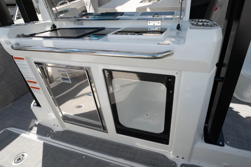 Slide: The Image of 2024 Jeanneau Leader 9.0WA S2 boat interior with sleek kitchen amenities. - 42