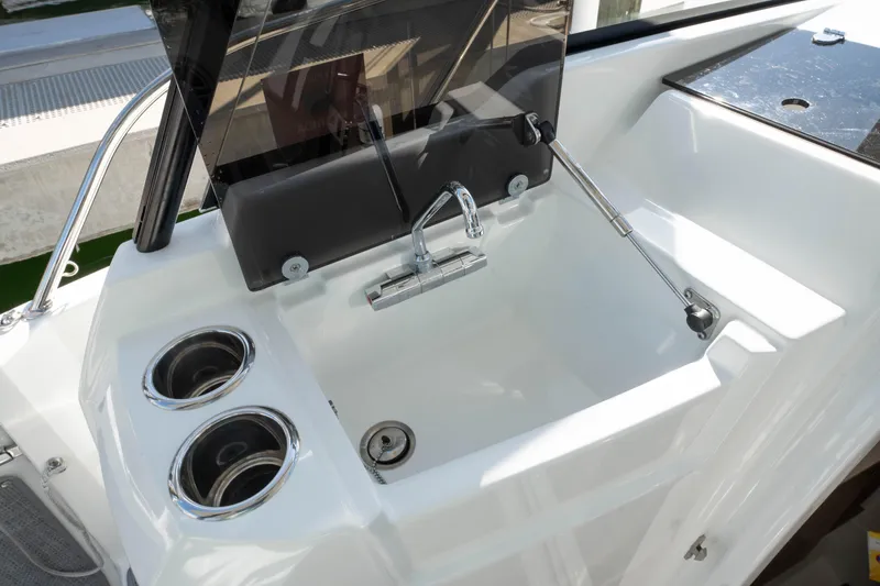 Slide: The Image of 2024 Jeanneau Leader 9.0WA S2 boat sink with dual cup holders. - 44