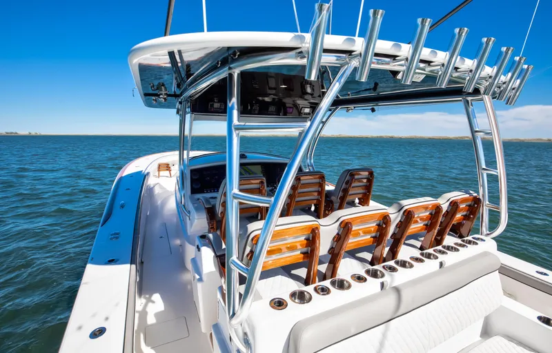 Slide: The Image of 2022 Valhalla Boatworks 46 Center Console on open water, showcasing sleek design and seating. - 14