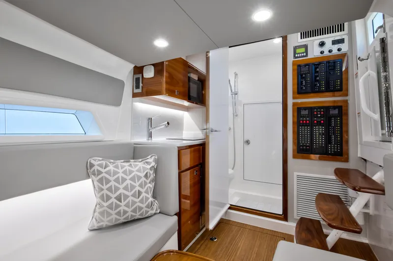Slide: The Image of Interior of 2022 Valhalla Boatworks 46 Center Console, featuring modern design and amenities. - 18