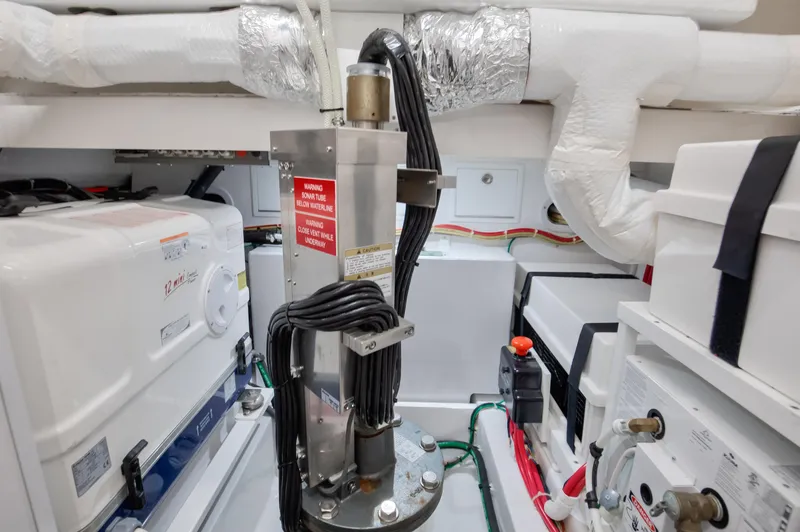 Slide: The Image of Engine room of 2022 Valhalla Boatworks 46 Center Console, showcasing mechanical components. - 21