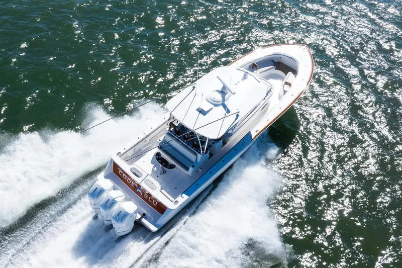 Slide: The Image of 2022 Valhalla Boatworks 46 Center Console cruising on open water. - 3