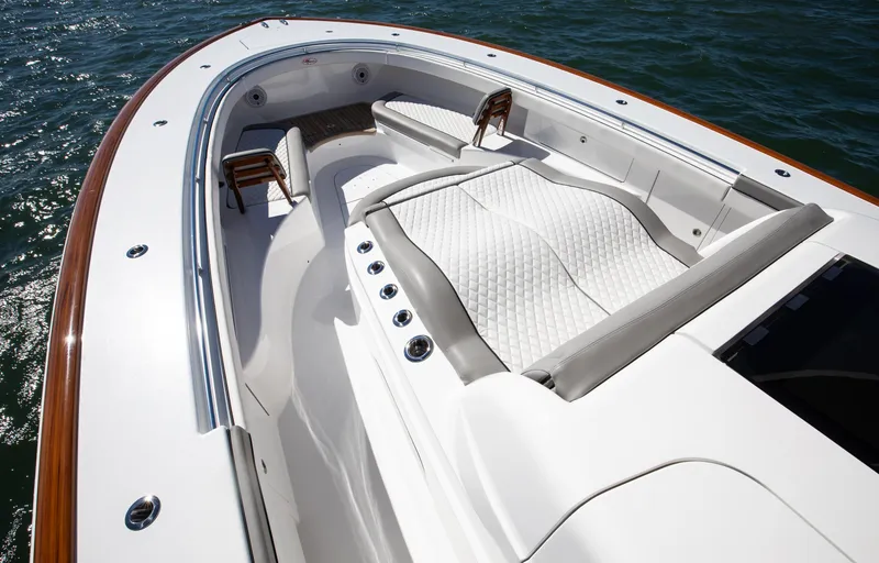 Slide: The Image of 2022 Valhalla Boatworks 46 Center Console, luxurious seating, sleek design on water. - 5