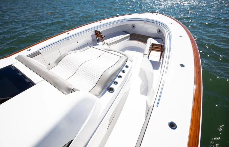 Slide: The Image of 2022 Valhalla Boatworks 46 Center Console, luxurious seating, sleek design on water. - 6