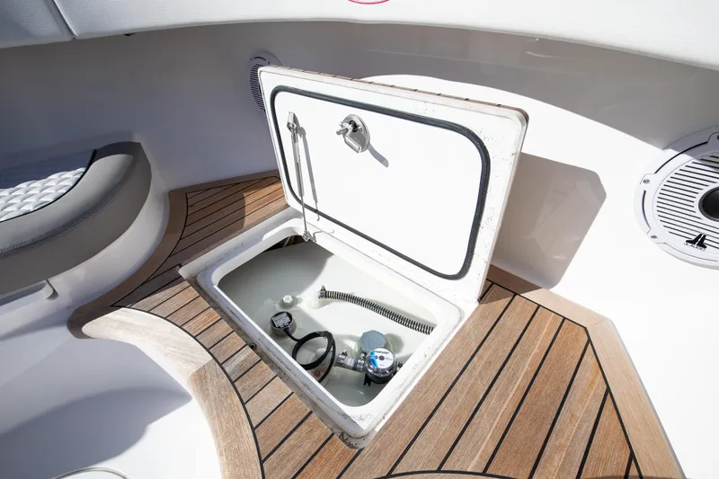 Slide: The Image of Valhalla Boatworks 2022 46 Center Console storage compartment with teak flooring. - 8