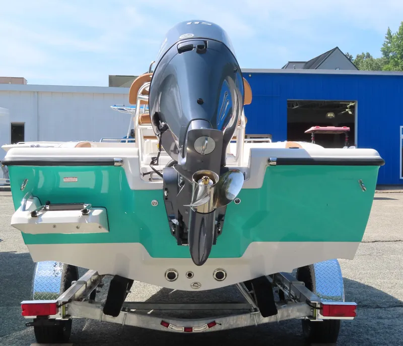 Slide: The Image of 2025 Key West 179 FS boat on trailer, rear view with outboard motor. - 26