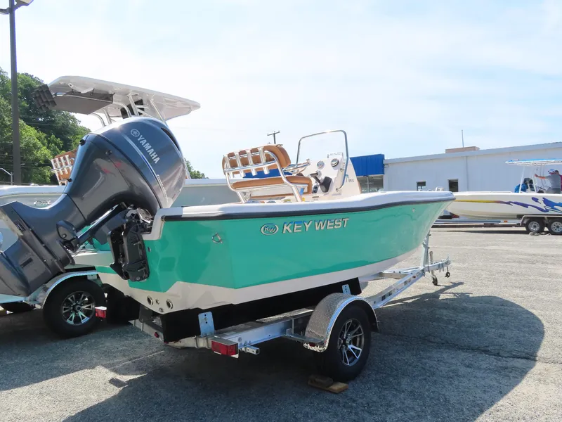 Slide: The Image of 2025 Key West 179 FS boat with Yamaha engine on trailer. - 3
