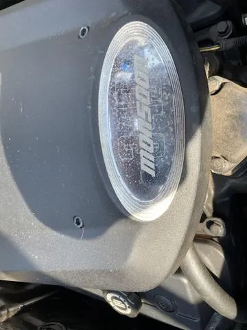 Slide: The Image of Close-up of 2005 Malibu Sunsetter XTi engine cover. - 11