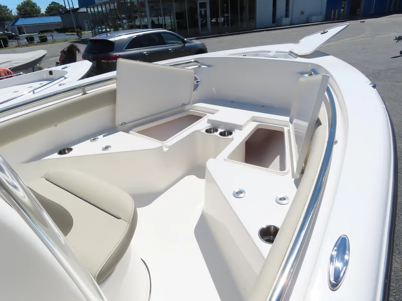 Slide: The Image of 2024 Key West 203 FS boat interior with seating and storage compartments. - 20