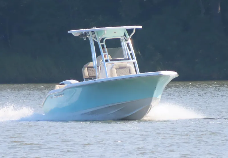 Slide: The Image of 2024 Key West 203 FS boat cruising on a calm lake. - 25