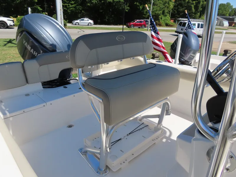 Slide: The Image of 2024 Key West 203 FS boat interior with seating and American flag. - 32