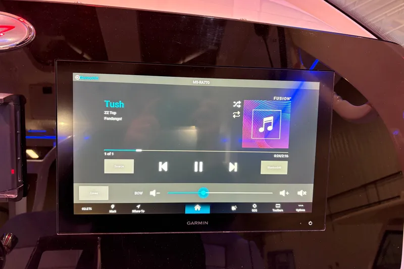 Slide: The Image of Touchscreen display on 2026 Scout 330 LXF showing music player interface. - 28