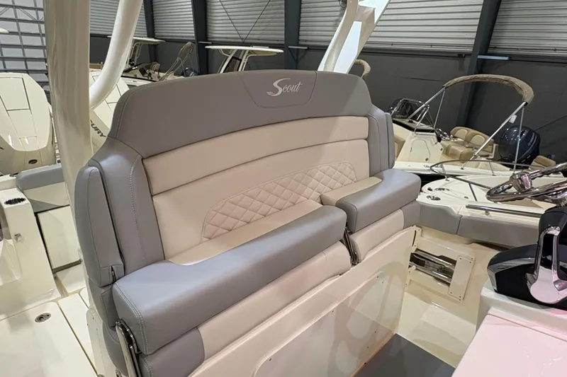 Slide: The Image of 2026 Scout 330 LXF boat interior with luxurious seating and modern design. - 34