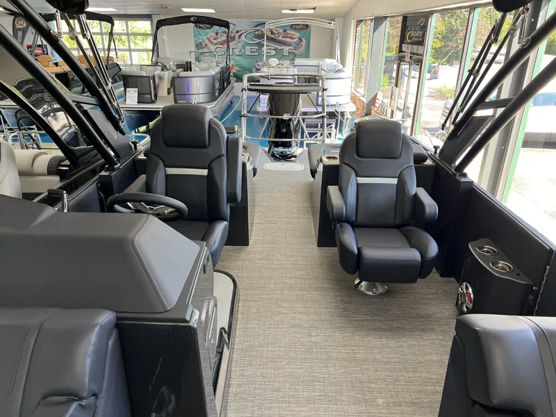 Slide: The Image of Interior of 2025 Crest Caribbean LX 230 SLRC boat with luxurious seating and modern design. - 13