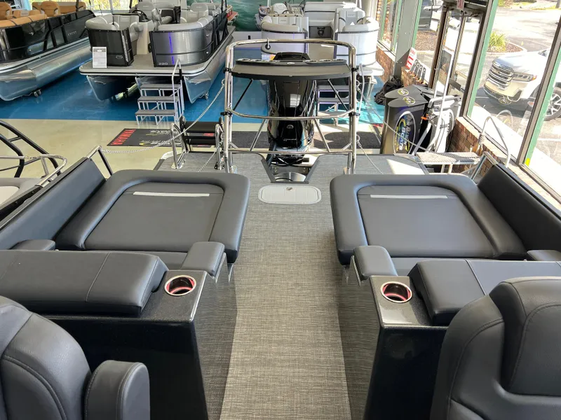 Slide: The Image of 2025 Crest Caribbean LX 230 SLRC interior with luxurious seating and modern design. - 16