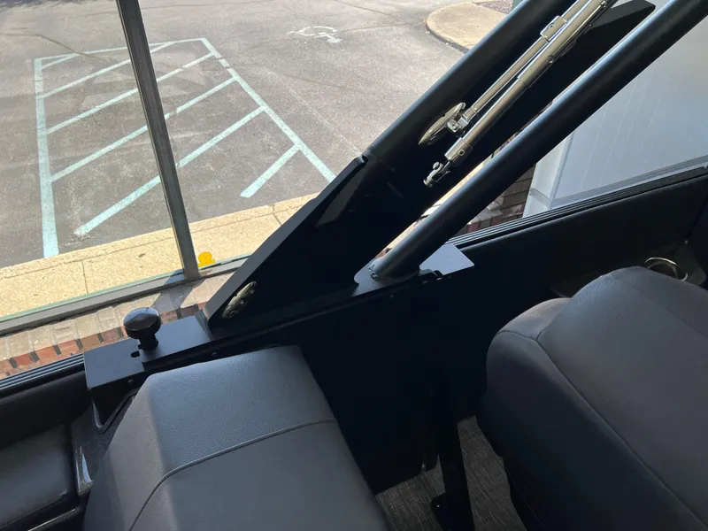 Slide: The Image of Interior view of 2025 Crest Caribbean LX 230 SLRC boat, showcasing seating and structural details. - 24