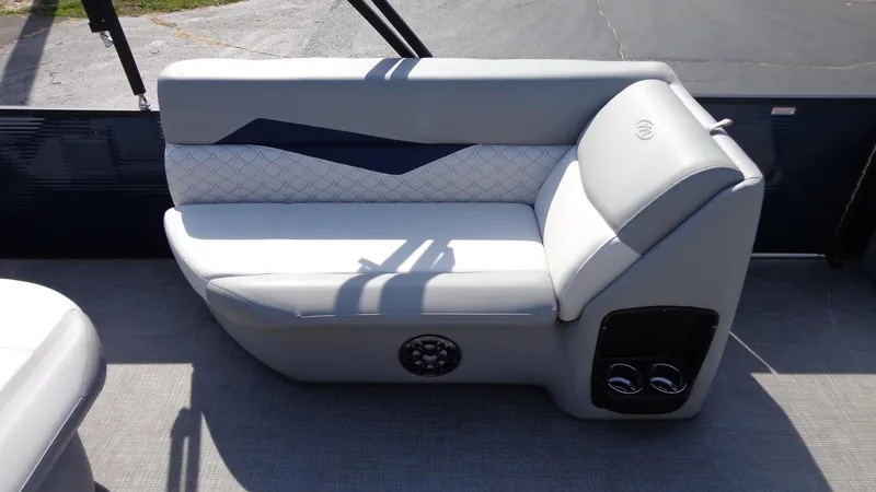 Slide: The Image of 2022 Manitou 23 SES Bench with stylish gray seating and modern design. - 11