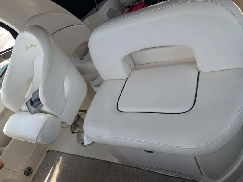 Slide: The Image of 2004 Sea Ray 360 Sundancer interior with white leather seating. - 10