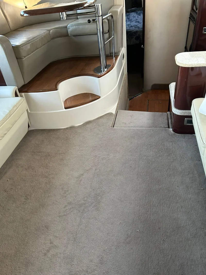 Slide: The Image of Interior of 2008 Sea Ray 44 Sedan Bridge, featuring plush seating and elegant design. - 30