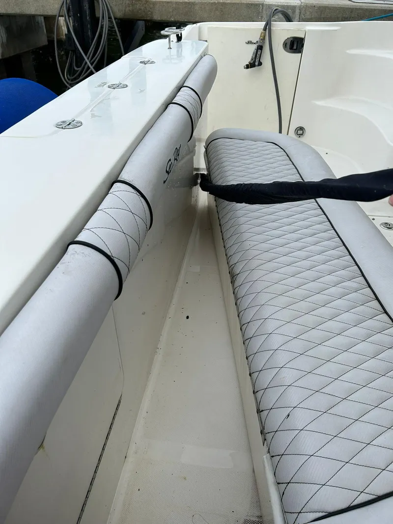 Slide: The Image of 2008 Sea Ray 44 Sedan Bridge interior with quilted seating and sleek design. - 38