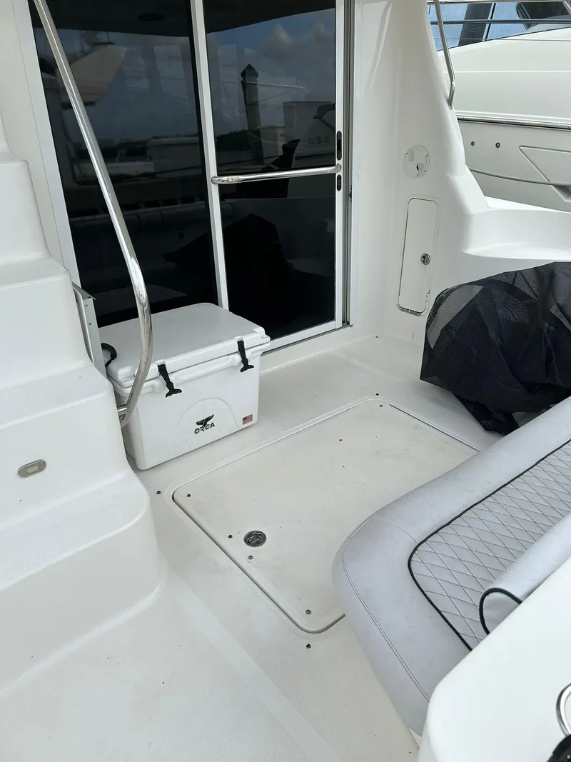 Slide: The Image of 2008 Sea Ray 44 Sedan Bridge yacht interior with seating and storage. - 44