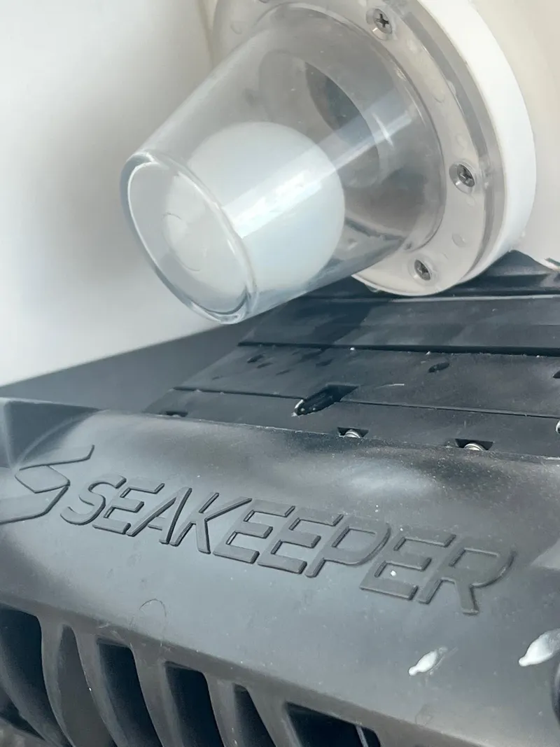 Slide: The Image of Seakeeper stabilizer on 2025 Bluewater 25 T boat, close-up view. - 14