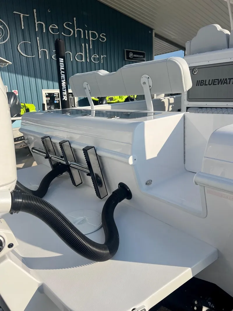 Slide: The Image of 2025 Bluewater 25 T boat at The Ships Chandler, featuring sleek design and modern amenities. - 6