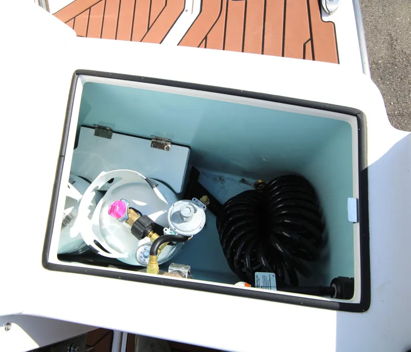 Slide: The Image of Storage compartment of 2023 Ranger Tugs R-27 Luxury Edition boat. - 22