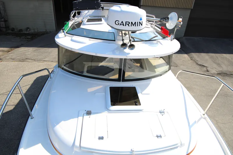 Slide: The Image of 2023 Ranger Tugs R-27 Luxury Edition boat with Garmin navigation system. - 26
