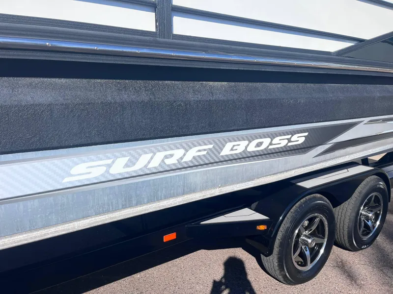 Slide: The Image of 2020 Montara Surf Boss boat on trailer, side view with branding. - 3