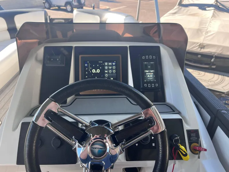 Slide: The Image of 2020 Montara Surf Boss dashboard with steering wheel and digital displays. - 6