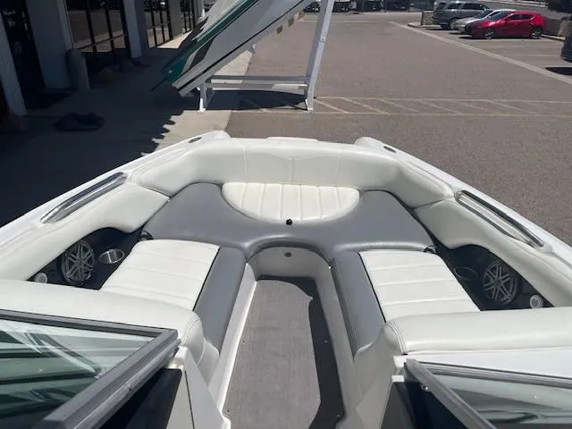 Slide: The Image of 2006 MasterCraft X45 boat interior with white and gray seating. - 12