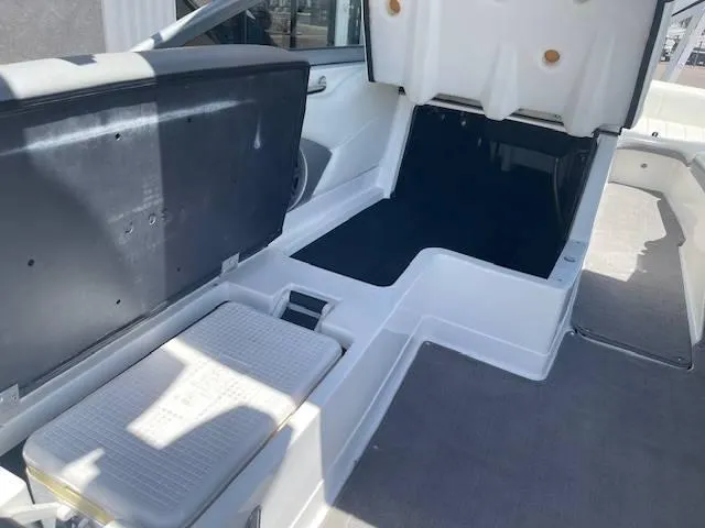 Slide: The Image of 2006 MasterCraft X45 boat interior storage compartment with open hatch. - 9