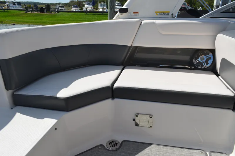 Slide: The Image of 2016 Chaparral 250 Suncoast boat interior seating with speaker detail. - 22