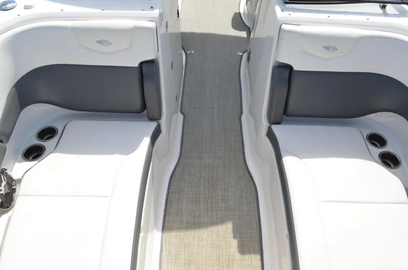 Slide: The Image of Interior seating of 2016 Chaparral 250 Suncoast boat with cup holders. - 36