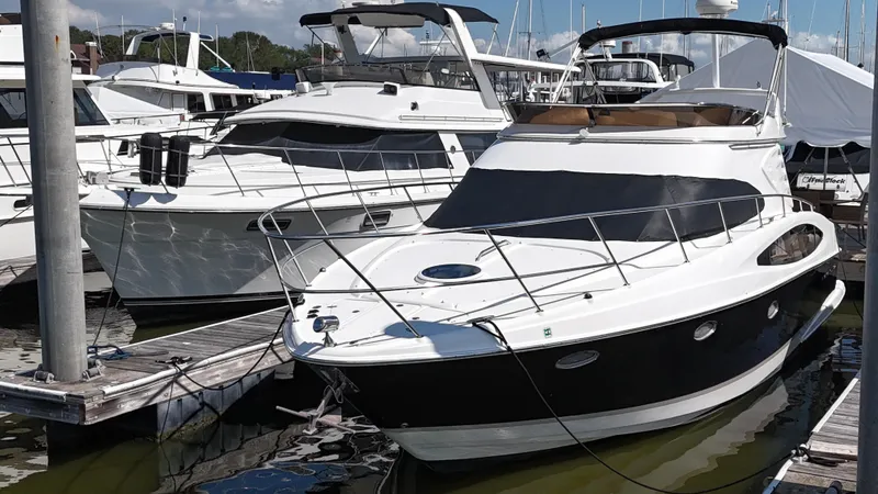 The Image of 2007 Regal 4080 Flybridge Sedan yacht docked at marina. - 0