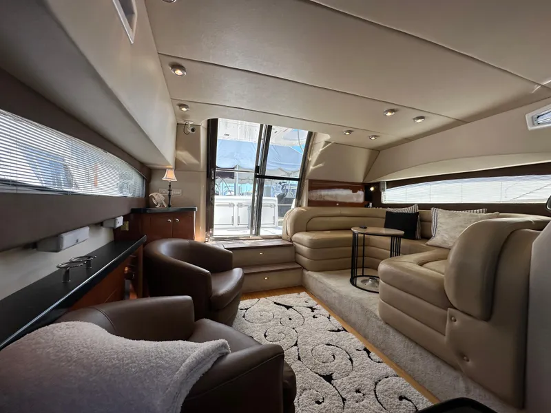 Slide: The Image of Luxurious interior of 2007 Regal 4080 Flybridge Sedan yacht with plush seating and modern design. - 35