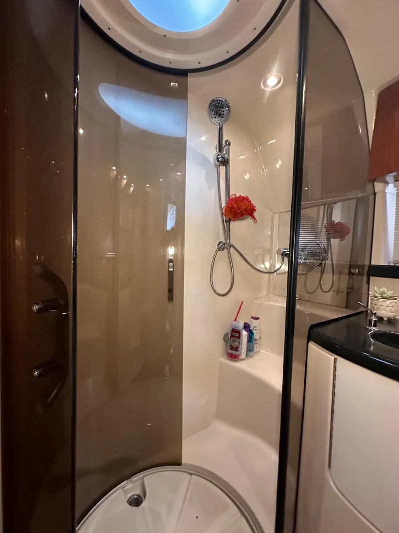 Slide: The Image of Luxurious bathroom in 2007 Regal 4080 Flybridge Sedan yacht with modern shower. - 49