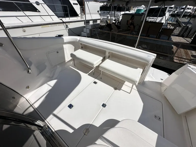 Slide: The Image of Regal 4080 Flybridge Sedan 2007 on open water. - 17